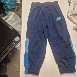 Nike Boys Navy and Teal Athletic Joggers.  Box 34